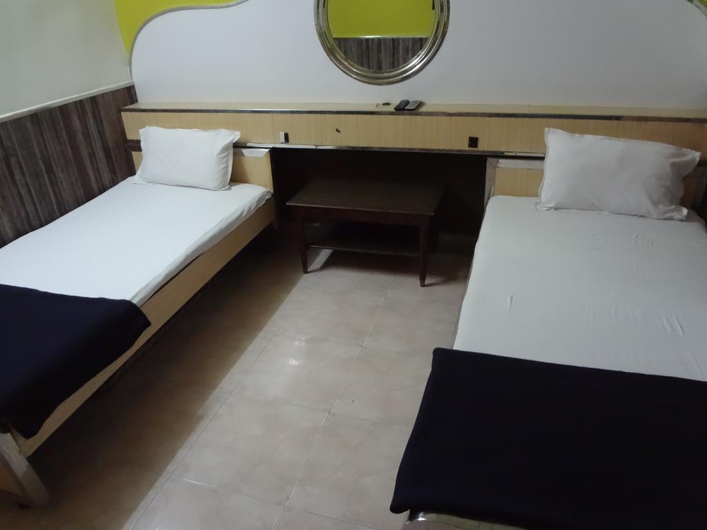 Hotel Happy Home Мумбаи Экстерьер фото