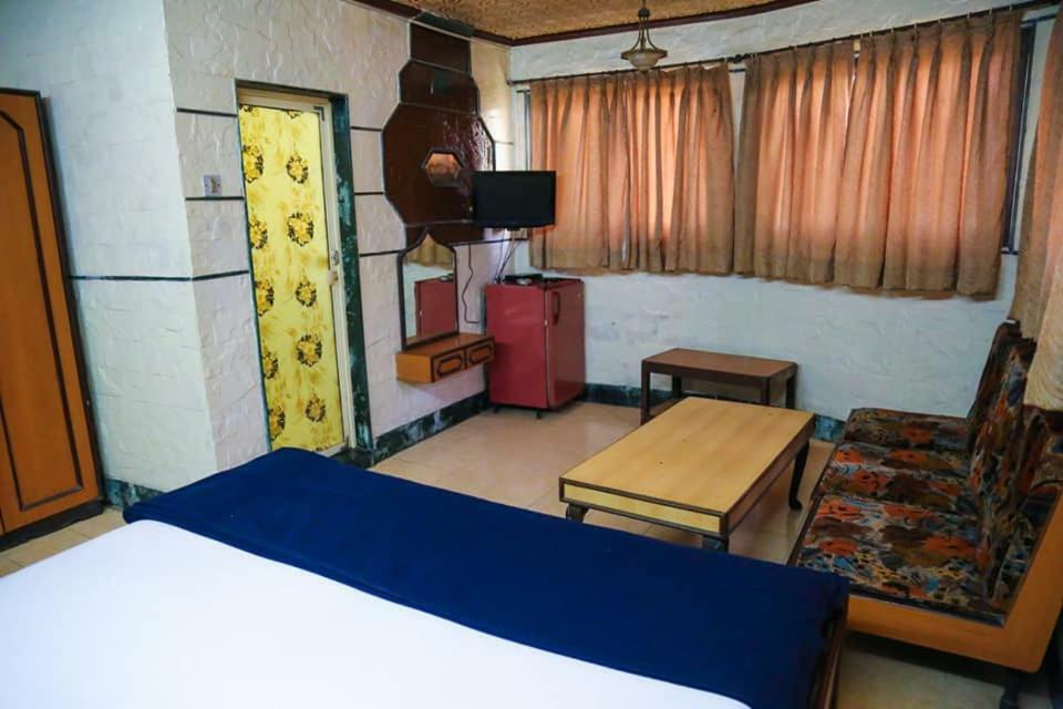 Hotel Happy Home Мумбаи Экстерьер фото